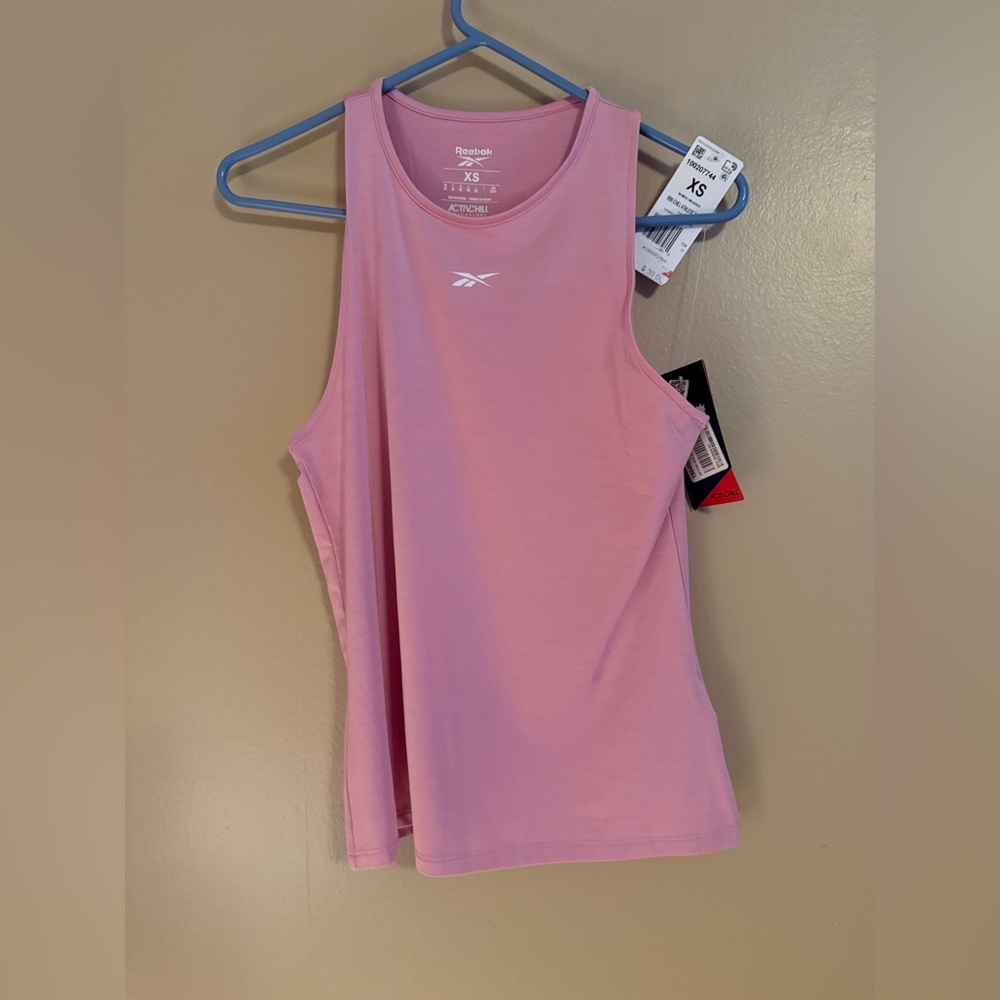 NWT Reebok Racerback tank
pink size XS